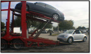 Start Loading the car on transporter up the ramp. Start Loading the car on transporter up the ramp.
